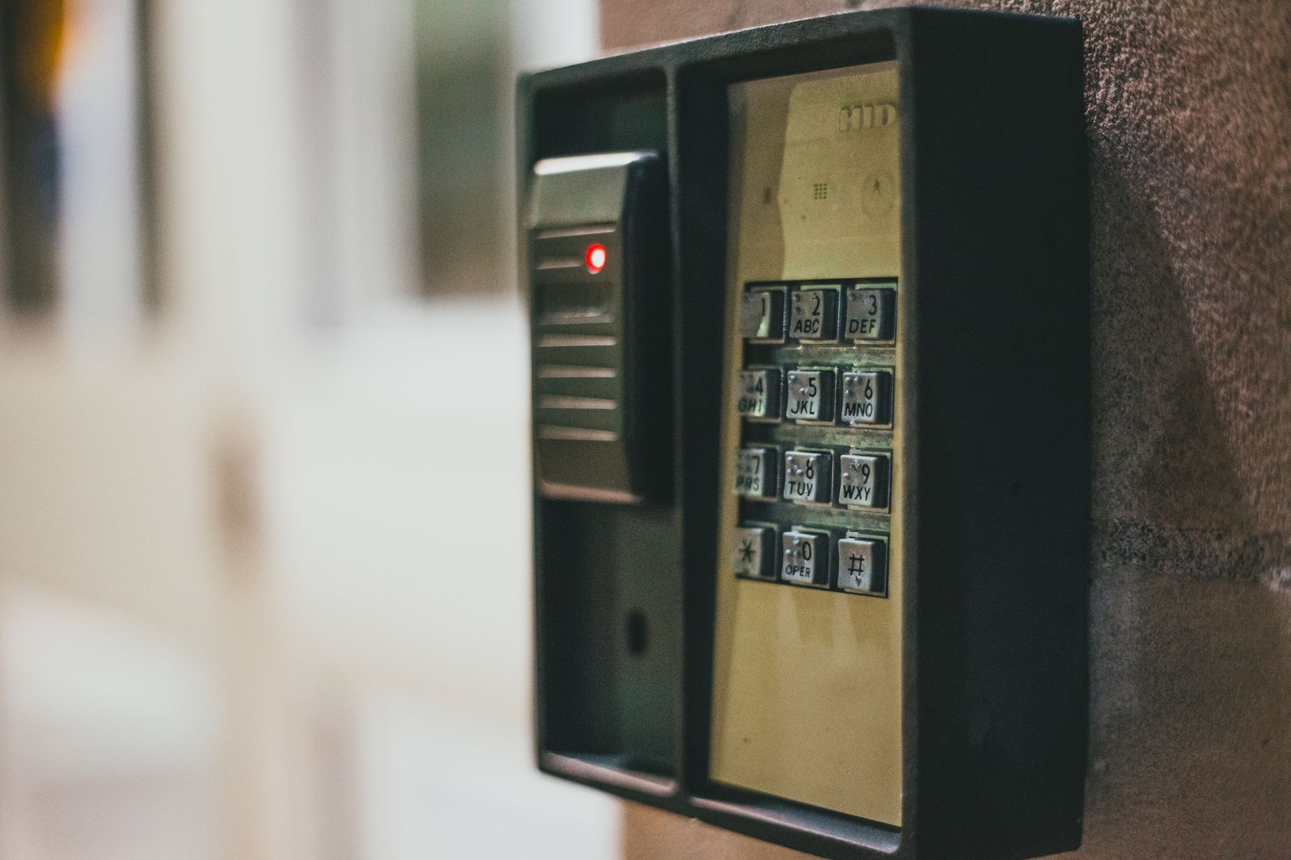 Close-up of a lit digital lock keypad