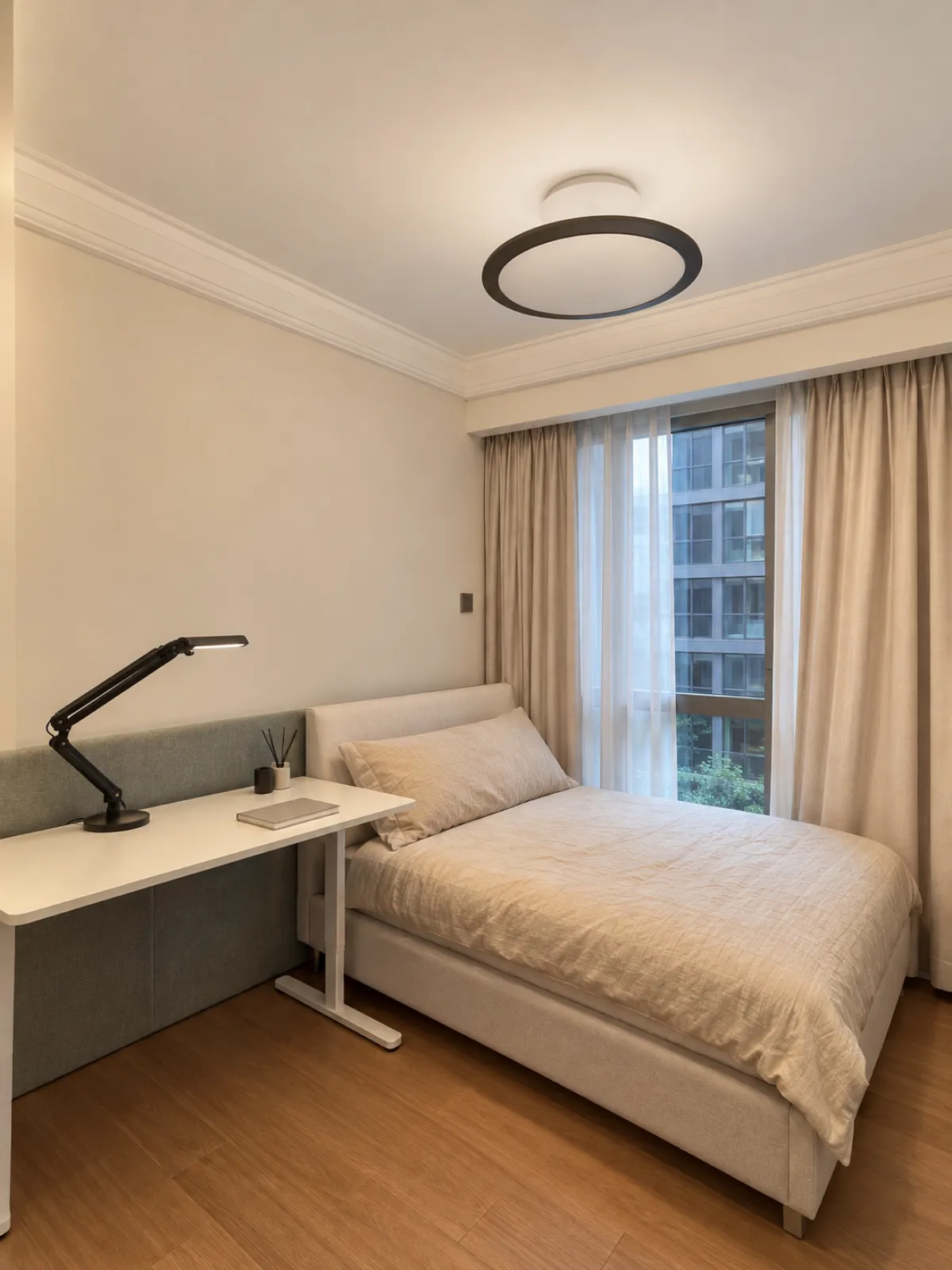 Study bedroom with a sheer day curtain and beige night curtain installed by Homey Furnishing